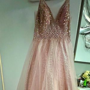 I'm listing a brand new, unworn evening wedding dress in pink, size large.